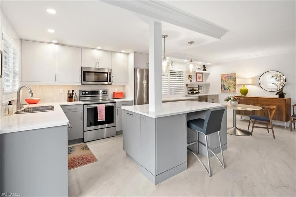 Photo of 3000 Gulf Shore BLVD N #106, NAPLES, FL 34103 (MLS # 225083208)