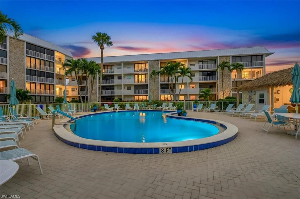 Photo of 3000 Gulf Shore BLVD N #106, NAPLES, FL 34103 (MLS # 225083208)