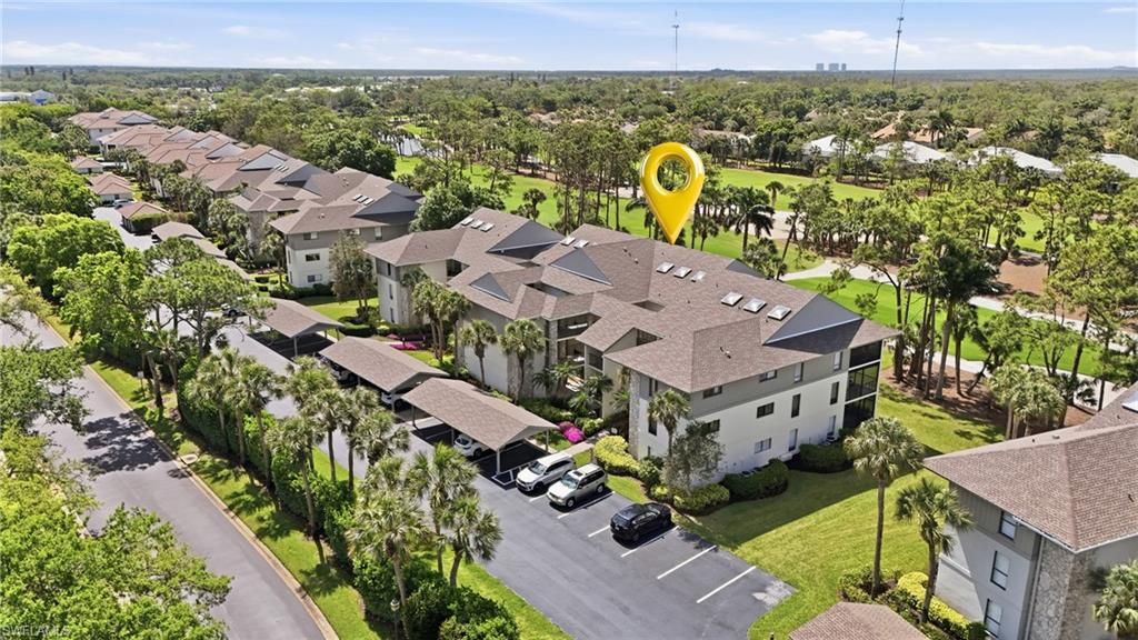 Photo of 764 Eagle Creek DR #H185, NAPLES, FL 34113 (MLS # 226013073)