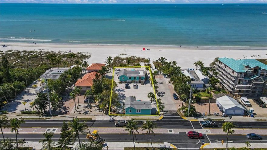 Come enjoy Stunning Sunset views and the ultimate coastal lifestyle experience from these TWO Gorgeous, Classic, Gulf front Cottage-style homes located on ONE OVERSIZED 75' WIDE parcel of perfect Gulf beach front. There is a total of 6 beds and 4.5 baths combined in these TWO homes. Plenty of ROOM FOR A POOL. The Main Beach house offers 4 bedrooms and 3 baths (2 are Ensuite); which features Open concept living at its finest. You will be charmed with the refined coastal décor, beautifully finished cypress floors, whitewashed walls and 40 feet of windows to enjoy the Sand & Water views. A NEW wide gulf Gulf front deck provides plenty of seating for outdoor dining and large family gatherings. The 2 bedroom 1.5 bath Guest Cottage features a brand new kitchen and dining area offering partial Gulf views as well; with a private deck to catch the warm sunshine too. This is a ONE of a KIND Fort Myers Beach Location which can accommodate large gatherings or to Build your Gulf front Dream home here as well. Isn’t this just the home that you have been dreaming about?