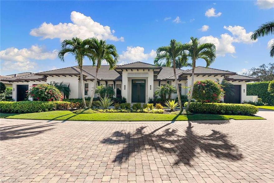 An exceptional value for an unprecedented custom coastal estate home in the double-gated community of Augusta in Pelican Marsh. This masterpiece exudes luxury with soaring 14-foot ceilings, custom millwork and 10-inch plank European oak flooring. With an open concept great room, dining room and innovative kitchen, butler’s pantry with four beverage drawers, two wine fridges and second dishwasher. Floor-to-ceiling windows open to an equally impressive outdoor living space overlooking a lap pool and lush landscape with complete privacy. Retreat to the private primary wing featuring an oversized marble shower for two, generous closet and built-in desk. Along with a large study and powder room, guests will appreciate three spacious bedrooms with en suites in the guest wing with a dedicated garage, second laundry room and access to the pool. No detail has been overlooked in this one-of-a-kind retreat. Control4 smart home automation, surround sound, see-through linear gas fireplace and too many features to list complete this luxurious North Naples oasis. Pelican Marsh offers pickleball, tennis and fitness all included. With A-rated schools, and the hottest restaurants in Naples and the beach within a short drive.