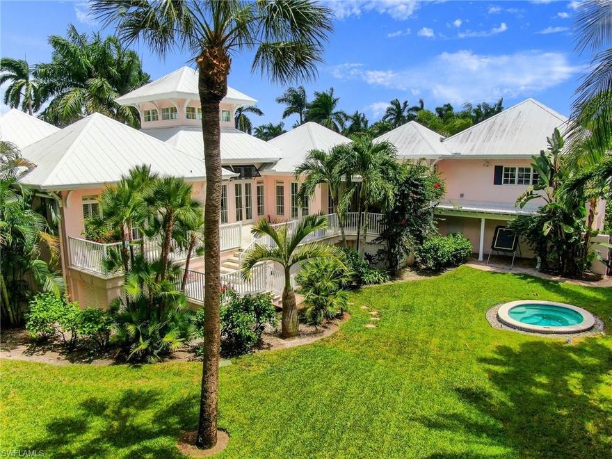 When opportunity knocks……This winsome Florida home is a spectacular offer on almost ½ acre you may not see again, especially for this price! Located south of Central Ave. on the very quiet 1st Ave S. and the renowned Gulf Shore Boulevard, this highly sought after and rarely available acreage (.46 acre) is one of the most unique in Old Naples. The 5 bed ensuite home on a significantly oversized lot, has 133 feet of width and 150 feet of depth, boasts Southern Exposure, Back Alley access, 2 homes to the celebrated sugar sand Beach, and 4 blocks to the internationally recognized Fifth Avenue. The home itself is a wonderful 2009 timeless, pristine Beach House with impact windows and doors, metal roof, open living room with 25’ sunlit cupola, and a huge kitchen all open to the outdoor living and expansive gardens.  The elevation is well above flood level allowing for unhindered additions or updating.  Whether you are looking for a charming beach home, or to build your dream home, this property is for you.  If you want to build a spec that can top all the competition, this lot and location provide the opportunity.