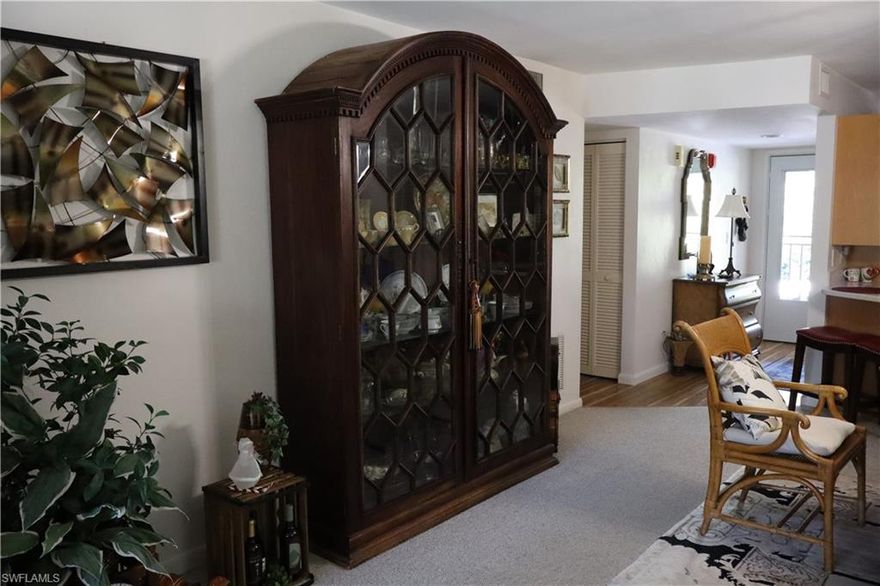 LOCATION, LOCATION, LOCATION! Fabulous View! This is the best-priced updated unit in the Pepperwood Condominium community in Naples, Florida. Bright, airy, and move-in-ready, this refreshed two-bedroom, two-bath home offers an inviting coastal feel. The kitchen highlights light cabinetry, coordinating countertops, and a stainless-steel appliance package.

Inside this beautifully maintained residence features plantation shutters, updated LED lighting throughout, ceiling fans, Berber carpeting in the bedrooms, and luxury vinyl plank flooring throughout the main living areas. Major upgrades bring peace of mind and long-term value: a new HVAC system and circuit breaker with two surge protectors installed in 2024; hot water heater replaced in 2021; hurricane-rated, sound-dampening sliding glass doors to the lanai and the main bedroom designed to withstand up to 160 MPH winds. Storm windows are also installed throughout the unit.  Maytag washer and dryer installed in 2023.

Plenty of thoughtful storage is found throughout the home, including a private downstairs storage unit. A deeded, assigned parking space and abundant and convenient guest parking for both residents and visitors.

Relax on your screened lanai overlooking the sparkling pool and lush tropical landscaping—your private sanctuary to enjoy the Naples sunshine. With extensive hurricane protection already in place, you can enjoy effortless seasonal security.

All of this just minutes to downtown Naples, renowned restaurants, boutique shopping, and the world-famous sugar-sand beaches—an exceptional value in one of Southwest Florida’s most desirable locations.