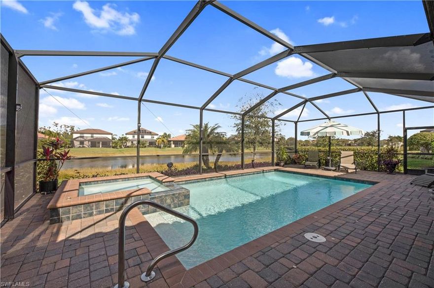 Welcome home to this gorgeous light & bright pool/spa-home in North Naples and located in the exclusive community of Raffia Preserve, this one is guaranteed to surpass your expectations. A premium lot positioned on a cul-de-sac, this residence effortlessly combines sophistication with practicality. Boasting an open & flowing floorplan featuring 4 bedrooms, 3 full bathrooms, 2-car garage, granite countertops, stainless steel appliances, his/her walk-in closets, newly upgraded pool equipment & automation system! Step out onto the extended screened-in lanai providing ample area for gatherings, entertainment & relaxation Here, you can bask in the joy of swimming in your very own pool & spa, all while being treated to breathtaking lake views. A standout feature of this exceptional home is the secondary master bedroom, providing a private & comfortable retreat for visiting guests or beloved family members. Located within A+ rated schools, minutes to shopping, dining & only 15 minutes to the pristine Gulf beaches and no flood zone! Immerse yourself in the luxurious lifestyle that awaits within the gates of Raffia Preserve.