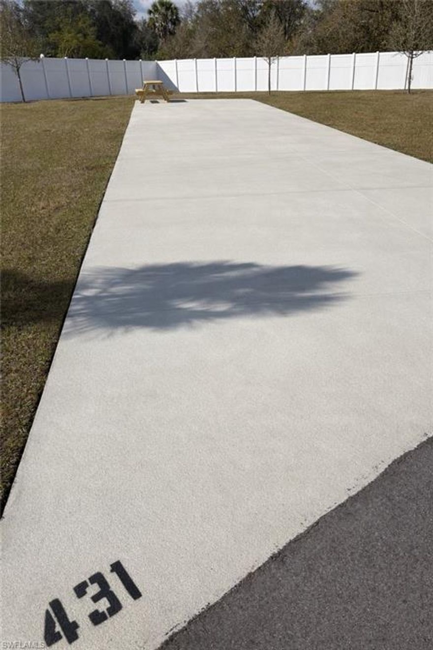 PREMIUM PERIMETER LOT  - EXPANDED FOOTPRINT - PRIVATE SETTING!!!! DON'T MISS THIS OPPORTUNITY!!!  Premium Oversized Corner Perimeter Lot!! 7739 sq ft EXPANDED FOOTPRINT!!! Opportunities like this are RARE, oversized corner perimeter lot!! Own one of the most desirable perimeter RV & cottage sites within Palm Breeze RV Resort. Lot 431 stands out for its expansive size and premium location, offering enhanced privacy and flexibility for customization—making it a true standout within the community.

This premium corner positioned RV Lot provides a more secluded setting while still being conveniently located near resort amenities. The generous footprint allows for a wide range of upgrades, including extended paver patios, outdoor kitchens, tiki huts, or a custom park model cottage—perfect for creating your own Florida retreat.

Palm Breeze RV Resort is a gated, all-class RV community accommodating Class A, B, C motorhomes as well as luxury fifth wheels, making it highly desirable for a wide range of RV owners seeking an upscale yet flexible lifestyle. Residents enjoy resort-style amenities including a heated saltwater pool, spa, clubhouse, fitness center, pickleball courts, dog parks, and more.

Ideal for both personal use and investment, this RV Lot is perfect for when you are here - and even better when you're not!!  Take advantage of the revenue share program, allowing your property to generate income while you travel.

Ideally located in CHARMING Punta Gorda, this property offers the best of Southwest Florida living—perfectly positioned between Fort Myers and Venice, giving you easy access to world class beaches, dining, shopping, and entertainment in both directions. Plus, you're just approximately 2 miles from Punta Gorda Airport for convenient travel.

Highlights:

Premium perimeter corner location with added privacy
Oversized lot with exceptional customization potential
Ideal for motorhomes and luxury fifth wheels BIG RIG FRIENDLY
Room for outdoor living enhancements or cottage placement
Prime location between Fort Myers and Venice
Close proximity to resort amenities and airport