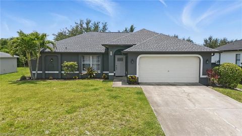 Photo of 320 NW 1st ST, CAPE CORAL, FL 33993 (MLS # 225049217)