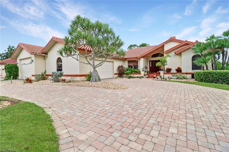 Beautifully UPGRADED estate on OVER A THIRD OF AN ACRE LOT with golf & lake views! This open-concept home is brimming with natural light courtesy of the vaulted ceilings, skylights & ample windows. Large entertainer’s kitchen is outfitted with stainless-steel appliances, granite counters, island & custom cabinetry. Relax on your spacious screened lanai with salt-water pool & views of the 2nd hole on the fairway & lake. Great room boasts wood beam ceiling accents & a double-sided fireplace. Private master suite offers a walk-in closet, fireplace & its own office/flex space with access to the lanai. Master bath boasts a walk-in shower with frameless door, dual sinks & tub. Upgrades include 2 A/Cs (2021 & 2017), upgraded guest baths with custom hardware & vanities & a 400 sq ft WORKSHOP WITH A/C! Additional features include extra bonus room/flex space, 5 CAR GARAGE, 2006-roof & 2008 pool pavers, massive circular paver driveway & gorgeous landscaping. At an additional fee to join the club, amenities include a 36-hole championship golf course, clubhouse & restaurant, tennis, bocce, fitness facility & more. Enjoy LOW HOA fees & quick access to every convenience imaginable in Fort Myers.