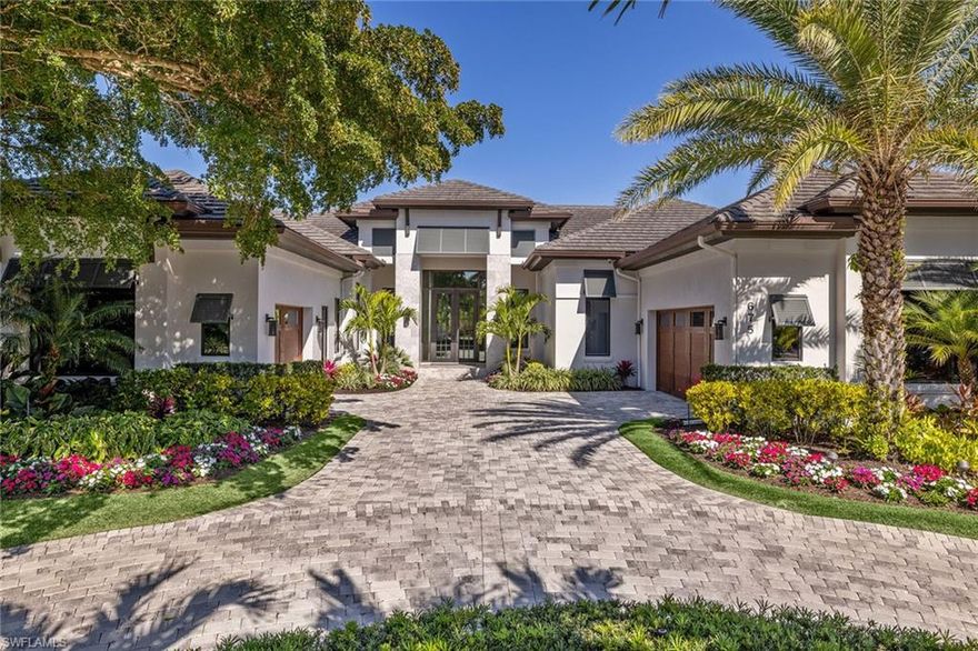 No hurricane damage, X-500 lot! Built by award-winning Stock Custom Homes. Fully furnished with luxury upgrades including Control4 home automation, CCTV digital watchdog, security system, automated blinds, air-conditioned garages & electric charging station, full-house generator. Soco Interiors' created a crisp, transitional design with clean profiles that will provide a fresh and comfortable ambiance. Subtle color palette includes whites, warm neutrals, soft greys and rich browns. Sophisticated, edgy accents throughout the home will convey temporary influences. Custom ceiling detail will be found throughout the home featuring the entry's backlit drop-down drywall ring to add an immediate and dramatic sense of height. Custom art pieces from local artists are found throughout the home. Reception room provides views of the incredible outdoor living area with fireplace, outdoor kitchen, oversized saltwater pool and spa. Wet bar includes pure white open-shelf cabinetry and ash-gray quartz countertops with corking station. Refrigerated wine room features a backlit floating wine display. Kitchen will delight with hidden pantry, Wolf, Sub-Zero appliances and cascading white marble bar.