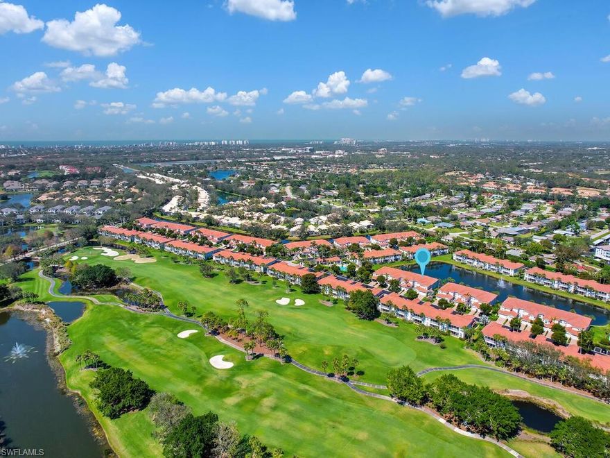Spectacular water view in this bright and sunny first floor "Sandpiper" end unit coach home with an attached garage. Enjoy the private screened in lanai with a view of the fountain and beautiful pastel sunrises & sunsets. The owner’s suite has two spacious closets and opens onto the lanai. The primary bath features dual vanities, a soaking tub & large shower. Each first-floor unit has a separate paver-bricked driveway & entryway courtyard. Relax at the Arielle resort-style sparkling pool, spa, cabana & grill area. Pelican Marsh community center offers * HarTru tennis courts, pickleball, state of art staffed fitness center, bocce courts, business center, social area & activities, spa services, The Nest Restaurant, miles of walking trails & a full calendar of social activities & events. There are 4 convenient access gates, US-41, Airport Road, The Shoppes at Galleria & Vanderbilt Beach Rd. Nearby is the Ritz-Carlton Tiburon & Mercato, which hosts a vibrant event calendar open to the public. Just 4 miles to the award winning Vanderbilt Beach or Delnor Wiggins State Park! Golf, social & dining memberships are available - not mandatory for additional fee. RSW Airport is 30 minutes away.