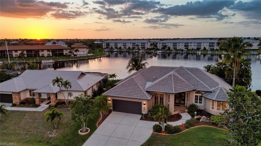 Expansive Open Water Views, 100 Ft Seawall, New Dock, PGI waterfront Living! Experience exceptional waterfront living in this 2002 custom-built Sandstar home in desirable Punta Gorda Isles, perfectly positioned to park your CATAMARAN-with an 83-foot dock and approximately 1,500 feet of expansive open water views. Designed to capture the best of the Florida boating lifestyle, this property offers a rare combination of quality construction, generous interior space, and major recent improvements. From the moment you arrive, the home makes a strong impression with its mature tropical landscaping, oversized driveway, and elegant entry. Inside, you’ll find a thoughtfully designed floor plan with 12-foot ceilings, double lighted tray ceilings in the great room, abundant natural light, and seamless flow to the outdoor living areas. The spacious kitchen features full granite counters, KitchenAid wall oven and microwave, Samsung 5-burner gas cooktop, GE refrigerator, GE Monogram hood, Ultra quiet Bosch dishwasher, and a butcher block center island with wine cooler, sink, and built-in trash/recycle storage. A granite bar area and reading nook with built-ins add character and function to the main living space. One of the standout features is the flexible dining room/office space with separate exterior entrance, ideal for a formal dining room, private office, studio, or home business setup. The third bedroom is currently configured as an office/entertainment room with granite counters and sliders to the lanai, offering even more versatility. The primary suite is a private retreat with a lighted tray ceiling, lanai access, and a spacious bath featuring a jetted tub, walk-in shower, and dual walk-in closets. The split-bedroom layout also creates a comfortable guest wing with added privacy. Outdoor living is where this home really struts around like it owns the marina. The screened lanai showcases a new panoramic pool cage with a 50-foot picture window, maximizing the spectacular water views. The pool has been recently resurfaced, and the lanai is already plumbed and wired for an outdoor kitchen, making it ready for entertaining. Boaters will appreciate the new dock, 100 feet of concrete seawall, and wide water outlook that delivers the true Punta Gorda Isles experience. Recent upgrades and notable features include new roof, new pool cage, new pool resurface, new AC, new double entry door lites, whole-house generator with 500-gallon underground propane tank, whole-house stereo, city water and sewer, fiber optic availability, and full hurricane protection for all windows and openings except the garage door. This is a rare opportunity to own a well-built custom waterfront home with an impressive boating setup, flexible living spaces, and one of the features buyers want most: big open water views. Coveted PGI Bird Section. Near private Saint Andrew’s Golf Course, The Punta Gorda Isles Yacht Club and Fisherman’s Village. Don’t miss this Call today Catamaran Parking!
