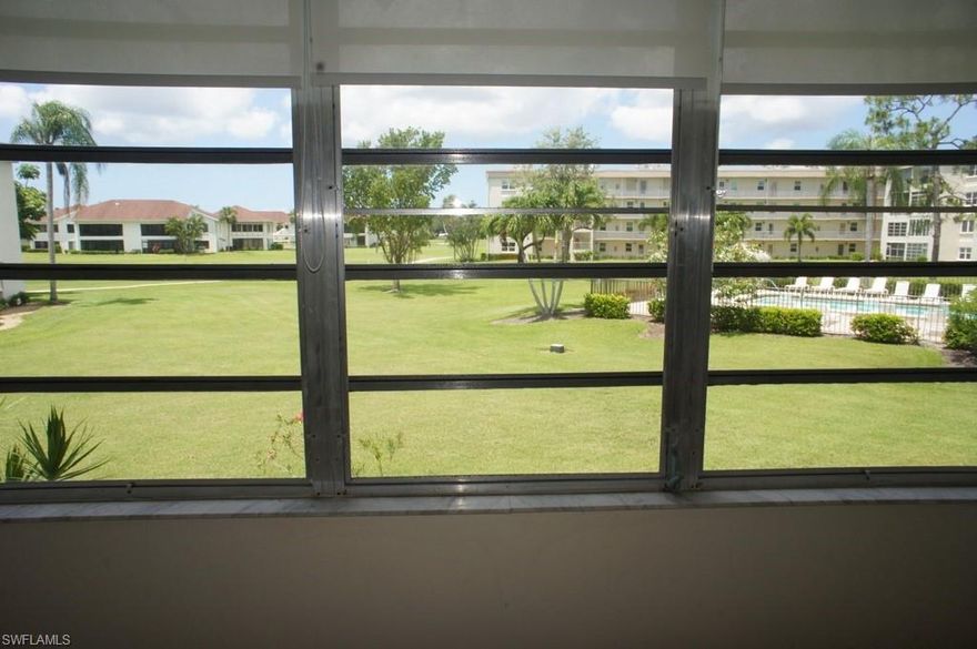 Perfect Condo Home in the Heart of South Fort Myers in the Active Community of Seven Lakes!!!  This unit is an Updated two bedroom, one bath light and bright Condo. Upscale Tiled Bath with Walk in Shower. New Kitchen with Cortex Counters and Laminate Wood Floors throughout main living area and bedrooms; Valuable CARPORT SPACE 34  included with this unit.  NEW WINDOWS IN BEDROOMS AND KITCHEN. BEAUTIFUL VIEW OF POOL, close and convenient. Gated and secured Community offers Privacy and Amenities Galore.  You can be as active as you'd like here, between Free Golf, Tennis, 6 Heated Pools, Dances, Socials, Exercise Gym, Library, Potter, Crafts and Wood Shop.  Onsite Bar Restaurant Available for your Convenience and Pleasure.  Simplify your Lifestyle in a Condo Home Community.