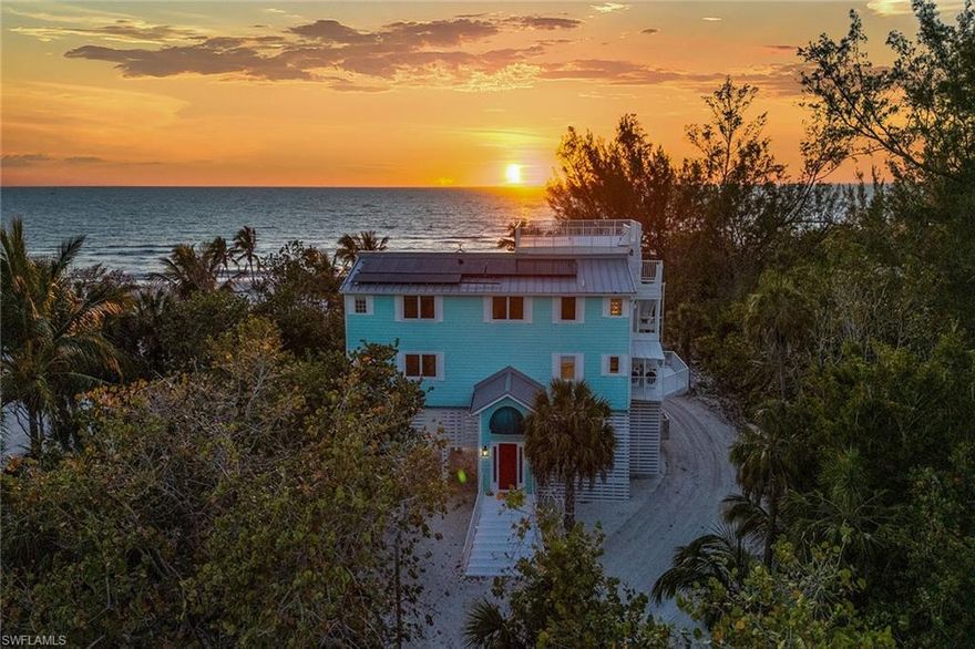Have you dreamed of owning a secluded Gulf-front escape with sweeping, unobstructed views of turquoise waters, sugar-white sand beaches, swaying tropical palms and spectacular sunsets from every window? On 2.57 acres of pristine shoreline on Keewaydin Island, this remarkable three-bedroom plus den, three-and-a-half bath retreat offers a rare opportunity to live like you’re on vacation every day. Surrounded by the Gulf on one side and the Intracoastal Waterway on the other, the property features 107 feet of spectacular beachfront, western exposure and deep water dockage with two lifts, all in a boat-access-only location, ensuring the utmost privacy. Spanning three levels of open-air decks, including a screened second level with a spacious covered outdoor living area and a modern ceiling fan, this residence is designed to fully embrace the island lifestyle and panoramic Gulf views. Whether sunbathing in seclusion or entertaining in a uniquely memorable setting, every moment here feels like a private retreat. Recent upgrades include a new ground-level patio, railings, roof, solar power system, generator and exterior paint, as well as new path lighting, two exhaust fans in the generator room, and a recently constructed beachside shed which enhances comfort and functionality. Inside, over 2,500 square feet under air showcases custom door frames, diagonal tile flooring, and thoughtful enhancements like new interior paint, blinds, lighting and ceiling fans. The chef’s kitchen is a showstopper with white cabinetry, under-cabinet lighting, a striking tile backsplash and premium appliances, including a six-burner Viking gas range with hood, pot filler and stand-alone ice maker. The dining area, featuring a custom mirrored wall and glass sliders, seamlessly connects to the outdoor living space, blurring the line between comfort and coastal air. The living room, highlighted by vaulted ceilings and a built-in fireplace, is framed by breathtaking beach and water views, while an outdoor elevator lift provides convenient access to all levels. The owner’s suite is a private sanctuary, featuring French doors to a private deck, a walk-in closet with custom built-ins, and a spa-style en-suite bath with dual-sink vanity, jetted soaking tub, and a floor-to-ceiling tiled walk-in shower. Guest bedrooms each offer private balconies and serene water views, and a versatile den provides space for guests or remote work. Additional comforts include six new mini-split systems, a new washer and dryer, a sauna, and satellite TV and internet capabilities, ensuring modern connection in a completely self-sufficient, off-grid setting. Keewaydin Island is peaceful and serene, rich in native flora and fauna, offering a lifestyle defined by natural beauty, privacy and luxury, just minutes by boat from Naples or Marco Island. Schedule your private showing today.