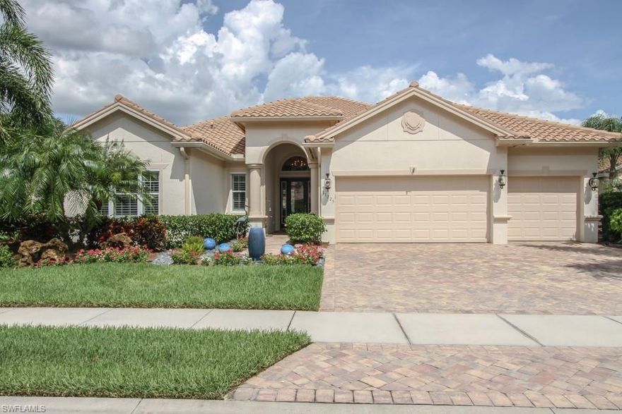 MOTIVATED SELLER! Home on 1/2 acre lot! Only $168 per sq. ft.! With 3205sq. ft. under A/C, the total sq. ft. of this lovely Centex home is 5788 including the 3 car garage and enclosed large lanai. The open floor plan includes an attractive neutral-colored ceramic tiled entryway leading to a large ceramic tiled living room and dining room that opens to the gourmet kitchen with a breakfast bar . The kitchen has an Electrolux gas cooktop, designer 42" cabinets, granite countertops, a large pantry. The highest standards are evident with attention to detail throughout the home…crown molding, tray ceilings, ceramic tile flowing from room-to-room, wood flooring in the bedrooms, plantation shutters, fine quality kitchen and bathroom hardware. Enjoy the private lush landscaping and preserve views on your half acre lot with foliage-lighting and privacy.  Relax & enjoy your 30'x40' salt water pool and spa!  This home also has Kevlar electric storm screens for secure protection, whole house generator & a total of $150,000 in upgrades. Located close to shops, dining & RSW airport; Great amenities at the new community center.