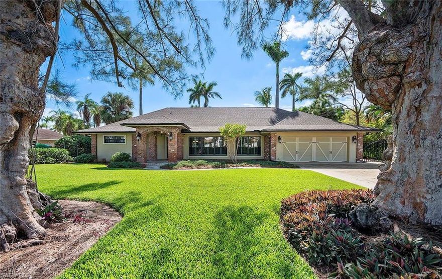 Set on a picturesque street lined with luxury residences, this meticulously maintained and charming 3-bedroom, 3-bath pool home offers 2,202 square feet of thoughtfully renovated living space on a .31-acre lot in one of Fort Myers’ most prestigious neighborhoods. A rare opportunity on sought-after Shaddelee Lane W, the home is ideally located in the heart of Fort Myers along the historic McGregor Boulevard corridor. Known for its river views, walkability, and beautiful estate homes, the setting blends timeless charm, privacy, and exceptional convenience, creating a serene retreat in a highly desirable location.

Fully renovated, the home was thoughtfully reimagined to create the open-concept living and dining areas and to incorporate distinctive brick architectural details and a gas fireplace, creating a warm yet sophisticated ambiance. The modern kitchen is elegant and functional, offering granite countertops, a center island, breakfast bar, soft-close shaker cabinetry, GE Profile appliances, a new refrigerator (2023), and a gas cooktop —ideal for entertaining and everyday living. Recent updates in 2023 further elevated the home. 

Designed for Florida’s indoor-outdoor lifestyle, the expansive screened lanai provides multiple areas for dining and relaxation, overlooking a heated pool and spa with a waterfall feature. The primary suite enjoys direct access to the lanai, placing the pool and spa just steps away. Lush, mature landscaping surrounds the property, offering exceptional privacy and an outdoor retreat. 

Additional highlights include plantation shutters throughout with garden views, impact windows, a new roof and gutters (2023), an updated laundry room with washer and dryer (2023), new water heater (2025), wireless pool management system, and a two-car garage with epoxy flooring—all reflecting the pride of ownership and careful maintenance throughout the home. Also included are a 250 gallon propane tank and Reme Halo air purification system. 

This home must be visited in person to be fully appreciated. Centrally located near highly rated schools, upscale dining and shopping, fitness centers, premier golf courses, local theatre and the Barbara B. Mann Performing Arts Hall, and with island beaches not far away, this residence captures the best of Florida living in a desirable and friendly neighborhood.