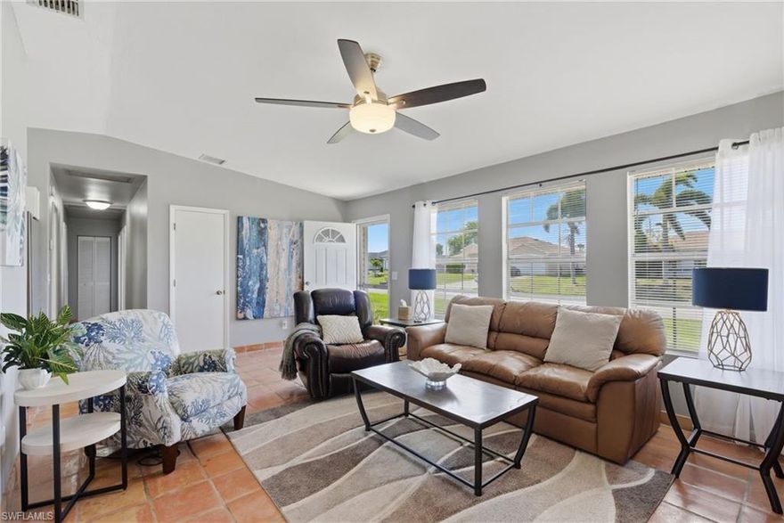 Affordable, move-in ready, and beautifully updated, this 3-bedroom, 2-bath North Cape Coral home combines classic Florida charm with major upgrades!  Excellent full-time, part-time or rental property.  The remodeled kitchen features white soft-close cabinetry, quartz countertops, and stainless-steel appliances, creating a bright, fresh space that immediately feels like home. The primary bath was beautifully remodeled in 2024, while the guest bath was newly renovated in 2025, giving both spaces a clean, modern appeal. Beautiful original terrazzo floors, stripped and sealed in 2025, add timeless character and classic Florida charm throughout. The large, screened lanai and spacious backyard create the perfect setting for relaxing, entertaining, gardening, pets, or adding a future pool. Major updates include a 2022 roof, HVAC replaced in 9/2025, water heater in 2024, and water system pumps in 2024, offering true peace of mind. Conveniently located near shopping, dining, and everyday conveniences, this home delivers the ideal combination of style, space, and value in North Cape Coral.