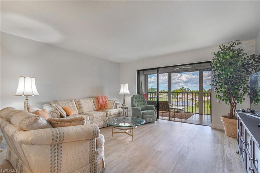 Move right in, this top floor Laurel Model has 1323 sq ft of living space with updated kitchen with white shaker soft close cabinetry and Quartz countertops.  Some other updates include Luxury Vinyl Flooring throughout the condo New Impact Window in the primary bedroom, full size washer and dryer, 6 panel doors and new trim and Hardware, Electric Hurricane Shutter off the Lanai for your added protection and no popcorn ceilings.  Screened-In Lanai has a beautiful view of 3 lakes and the golf course.  A/C is 2020.  CAR PORT SPACE #40 AND GOLF CART SPACE #L13 INCLUDED!! 
Seven Lakes is an active 55+ community with lots of amenities. 6 heated pools throughout the community, golf course (for two owners per unit to pay with no fees), tons of clubs, auditorium which host dinners, dancing, bingo and trivia along with outside entertainment. A bus to take residents to other activities outside the community. Hobby and craft rooms, billiards, shuffleboard, bocce ball, 6 tennis courts and pickle ball too. Exercise Room, Lapidary with classes.  Awesome Library! Full Time Recreation Department Puts Out Calendar of Events in our monthly Newsletter. Private Restaurant & Bar Has Weekly Events like Karaoke and Trivia, Theme Dinners & Happy Hours. Start Living the Seven Lakes Lifestyle, you will love our community.