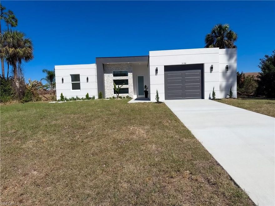 Discover modern living at its finest in this stunning contemporary home — the only one of its kind in LaBelle, Florida. Thoughtfully designed with clean lines and upscale finishes, this 3-bedroom, 2-bathroom residence offers both style and functionality.
Step inside to an open-concept layout filled with natural light, perfect for everyday living and entertaining. The show-stopping quartz waterfall kitchen island anchors the space, providing generous prep room and elegant visual appeal. The kitchen seamlessly flows into the main living and dining areas, creating a bright and inviting atmosphere.

The primary suite offers a private retreat, complete  bathroom featuring porcelain tile in the stand-up shower and a sleek LED mirror for a modern touch. The additional bedrooms are spacious and versatile, ideal for family, guests, or a home office.

Enjoy Florida living year-round in the expansive lanai — perfect for relaxing evenings or hosting gatherings. Additional highlights include an in-residence laundry room and a convenient one-car garage.

If you’ve been searching for contemporary design in LaBelle, this home truly stands alone. A rare opportunity to own a modern masterpiece in a growing community.