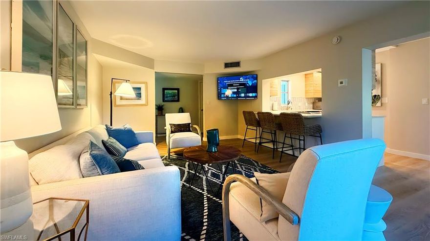 PROFESSIONAL PHOTOS COMING SOON — BOOKMARK THIS LISTING. Beautifully updated and fully furnished luxury 3-bedroom, 2-bath condo in the desirable Naples Bath & Tennis Club. Approximately 1,650 sq ft, featuring a modern kitchen with stainless steel appliances and stone countertops, in-unit washer and dryer, and a private screened lanai. Quiet, well-maintained community with lakes and mature landscaping, home to the Emilio Sánchez Tennis Academy. Centrally located, just minutes to shopping, dining, and Naples beaches.