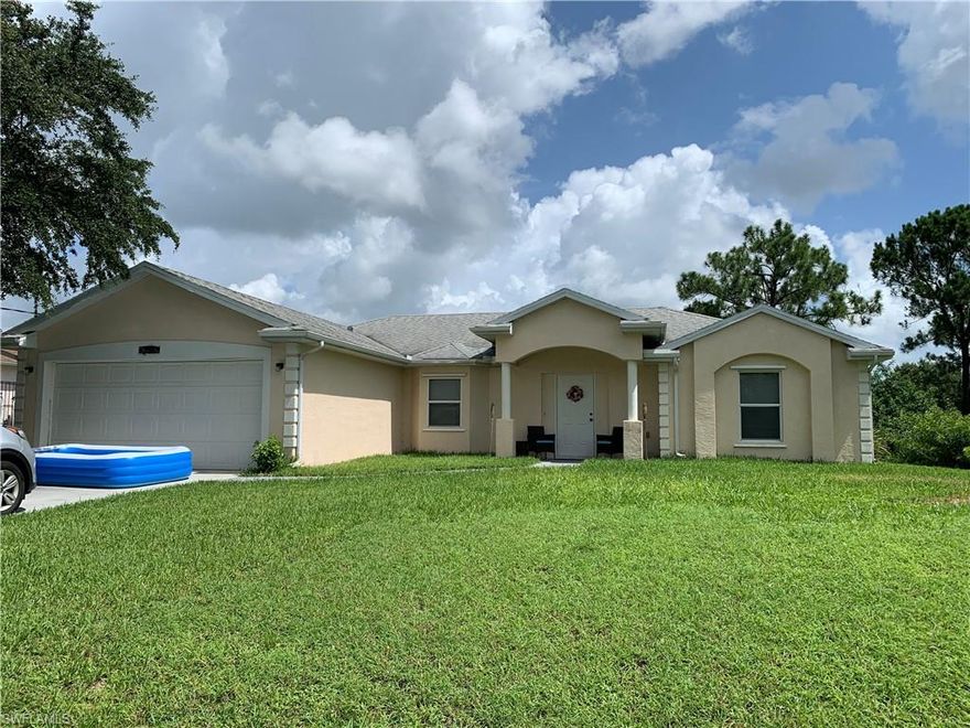 Storage galore in this great floor plan in Lehigh Acres on a quiet cul de sac. Great split bedroom floor plan with a huge kitchen with a large pantry. Large counter of blue corian, spacious and open floor plan. Master bedroom has a huge walk in shower, double sinks, private toilet area and even a bath tub! New tiled installed thru-out 2020, New Appliances 2020, Master shower replaced 2020 & New blinds thru 2020.  Newly painted inside 2020. Plenty of room for a swimming pool.  Agents see conf remarks for showing info.