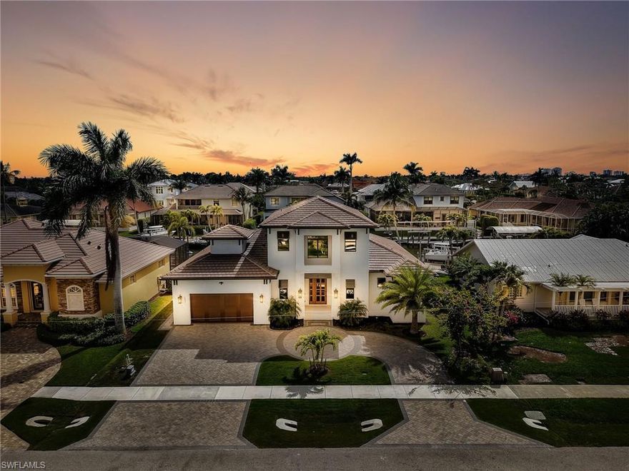 Discover the epitome of luxury living in this exceptional newer construction waterfront home on Marco Island. This home features 4 bedrooms plus DEN and 3.5 bathroom! Boasting desirable southern exposure, a newer seawall, and direct Gulf access with quick passage to open water, this stunning residence offers the perfect blend of modern sophistication and coastal charm.

Step inside to an expansive open-concept living space highlighted by soaring ceilings and an abundance of natural light. Walls of windows and sliding glass doors—featuring high-impact glass throughout—create a seamless connection between indoor and outdoor living while showcasing the home’s bright, airy design. Every element has been thoughtfully curated to deliver an atmosphere of refined elegance, from the welcoming grand foyer to the spacious living areas designed for both comfort and entertaining.

At the heart of the home is a gourmet chef’s kitchen, complete with top-of-the-line appliances, custom cabinetry, and premium finishes that make both everyday living and hosting effortless.

The outdoor space is a true private retreat. A generously sized pool deck surrounds a custom saltwater pool and spa, complemented by a fully equipped outdoor kitchen—perfect for relaxing afternoons, sunset gatherings, and year-round entertaining.

This newer construction waterfront residence on Marco Island captures the essence of coastal luxury living, where contemporary design, exceptional amenities, and the beauty of the surrounding waterways come together to create a home that is truly extraordinary. Welcome to a serene lifestyle along the canals of Marco Island.