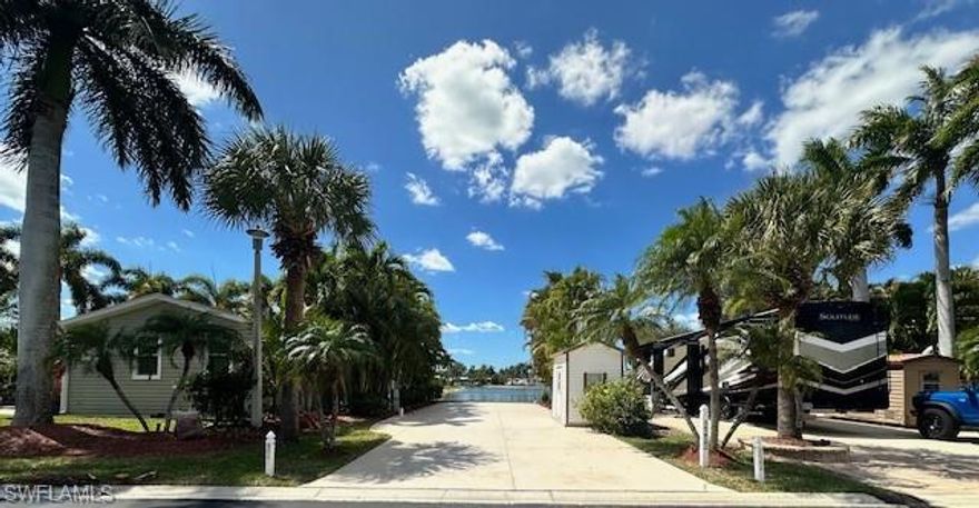 Enjoy stunning long lake views and beautiful western exposure from this desirable property, perfectly positioned to take in breathtaking sunsets each evening. Lush, mature landscaping surrounds the site, creating a private and serene outdoor setting.

Additional features include a 6x10 shed, providing convenient extra storage space. This is a wonderful opportunity to own a scenic, well-located property in a peaceful and picturesque setting.
Located in the highly desirable Silver Lakes RV Resort & Golf Club, this home offers resort-style living with golf, beautiful lakes, and an active community lifestyle in sunny Naples, Florida.

Don’t miss this opportunity to own a beautifully updated lakefront property in one of the area’s most sought-after communities.

Silver Lakes is a vibrant, gated community perfectly situated between Naples and Marco Island, offering the ideal blend of relaxation, recreation, and convenience. Residents enjoy deeded, fee-simple ownership and a host of resort-style amenities designed to support an active and social lifestyle.
This beautifully maintained community features a 9-hole golf course, two spacious clubhouses, three swimming pools, and two hot tubs. Stay active with access to pickleball courts, a fitness center, tennis courts, bocce ball, shuffleboard, horseshoe pits, billiards, and ping pong. The resort also offers a full calendar of planned activities and social events, creating a true sense of community. Just a short drive from downtown Naples, Marco Island, and the stunning white-sand beaches of the Gulf, Silver Lakes is the perfect home base for exploring the natural beauty and cultural attractions of Southwest Florida.