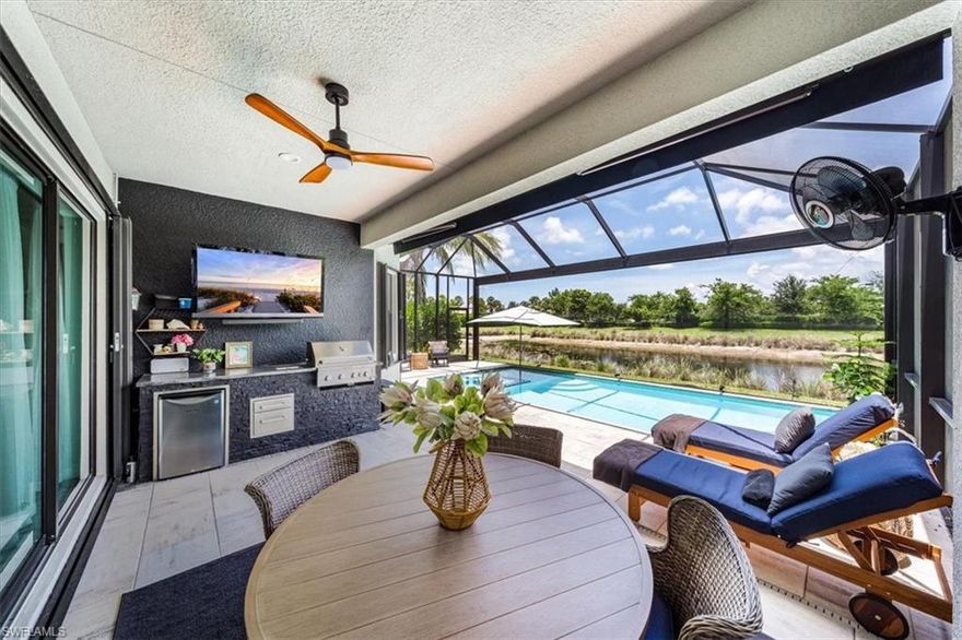 H10843-Outstanding opportunity awaits with this meticulously maintained, single-story Tribeca home featuring 4 bedrooms and 3 full baths. Upgrades galore! Stunning, upgraded tile flooring throughout main living areas, built-in wall shelving, stainless steel appliances (1-year-old), quartz countertops, tiled backsplash in kitchen, crown molding, Briggs and Stratton generator (17 KW), Reverse osmosis water system, electric awning for additional shade on lanai, 3 security cameras outside, alarm system, insulated garage door and tile flooring, tankless hot water heater. Beautiful pool & spa with outdoor kitchen & ceiling fan. Serene lake view. Convenient location within this popular community close to front gatehouse and amenities. You'll be sure to fall in love with this remarkable property.