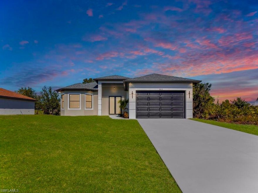 Welcome to this MARVELOUS (2025) BUILT completed 4/2 home nestled away on a quiet street in the HIGHLY DESIRABLE SW side. This GRAND elevation with flattering DOUBLE FROSTED front doors has Multiple TRAY ceilings & 8ft utlimate interior Doors plus a decorative IRON ACCENT at entrance spotlights an impressive OVERSIZED porcelain tile throughout, gorgeous QUARTZ rainfall countertops & backsplash with an inviting Attractive SHIPLAP breakfast bar, STAINLESS STEEL appliances, and SOFT CLOSE SHAKER cabinets with crown molding. It is nicely landscaped including a stone perimeter and highlights IMPACT WINDOWS & DOORS, outstanding TILED walk-in showers with FRAME-LESS glass doors plus rainfall & multiple shower-heads including built-in niches, brilliant soffit lighting, awarding dual sink vanities, elegant bidets, excellent HIGH SPEED internet, and dazzling premium fixtures. It also features pendant & recessed lighting, an EPOXIED garage & entrance, custom mirrors, a built in cabinetry pantry, ideal pocket doors, generous dual closets in master, a Laundry vanity sink, and an epoxy picture framed SCREENED back patio great for entertaining. This property is NOT IN A FLOOD ZONE just minutes from all major amenities & a quick commute to Fort Myers! Schedule your showing today!