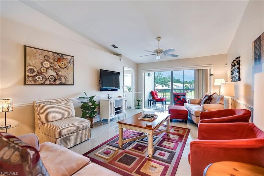 Nestled in the peaceful and quiet community of New Waterford in Berkshire Lakes, this 3 bedroom, 2 bath end unit condo on the 2nd floor has beautiful views of not one, but two lakes! Enjoy the breathtaking Naples’ sunsets while relaxing on your large screened-in lanai. Tastefully updated with gorgeous porcelain tile throughout, plantation shutters, and neutral décor, this condo shows like a model. The eat-in kitchen has stainless appliances, granite countertops and overlooks the large living room area. The third bedroom has been laid as a dining room with “pantry”, but can easily be converted back to a bedroom. The detached garage has space for extra storage and a new garage door opener was installed. The community pool is conveniently steps away for relaxing, and there is also a fishing pier and jogging path for your recreation. Whether for a full time residence or winter retreat, you have found the perfect place! This home is being offered turnkey, so just bring your suitcase, … we have your keys!