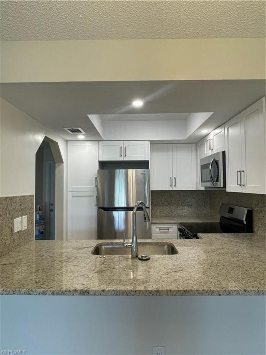 Well designed and completely renovated waterfront apartment, with brand new pass-through kitchen and stainless steel appliances; in-unit laundry; remodeled bathroom; upscale finishes including glass shower doors and new luxury vinyl flooring; and modern, high efficiency lighting and fans.  Screened lanai overlooking a canal.  Located in a quiet neighborhood nestled between Skyline and Chiquita boulevards, next to a City of Cape Coral boat ramp.  We are pet friendly. All of our properties are non-smoking. One year lease term. Landlord is responsible for all interior and exterior maintenance, as well as lawn maintenance and pest control.  Tenant is responsible for water and electric utilities.