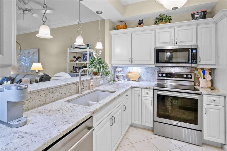 Pride of ownership in this one owner, 1st floor social membership garden home in Legends Golf & Country Club within easy walking distance to the clubhouse, tennis pickle ball, fitness center or either the local community pool or resort style pool with a killer open air restaurant. This beautifully decorated 2 bedroom, plus den property comes with a one car garage and offers a fantastic view across the golf course, lake and clubhouse. Some notable features are a new kitchen with custom cabinets, granite tops and stainless appliances, electric hurricane shutters and much, much more. The property is offered turn key furnished so pack your bags and start living.
The Legends is a very active community with social events, various clubs, dances, concerts and parties. Legends Country club has no city taxes or C.D.D. fees, making it one of the lowest taxed country clubs in SW Florida. Located close to shopping, dining, entertainment, l75 interstate and an international airport for easy travels. Resort style living waiting for you to call it home!