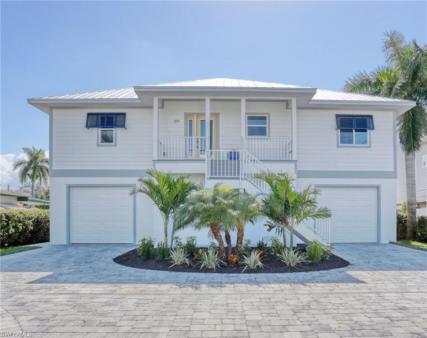 Special financing is available for this property. WEEKLY,RENTALS,NEW CONSTRUCTION,WATERFRONT, POOL. This stunning 3 bedroom, 2.5 bath furnished home is located in a highly desirable boating community on Fort Myers Beach. The 2nd floor living space is the definition of luxury with beautiful new furnishings, open concept floor plan, abundance of natural sunlight, cathedral ceilings, & sprawling lanai overlooking the deep-water canal & Back Bay. The Kitchen is perfectly complete with premium upgrades including Kitchen Aid stainless steel appliances, granite countertops, stone backsplash, extra tall cabinetry, & built in pantry. The designer touches continue throughout the bedrooms & bathrooms with elongated tile floors, solid wood panel doors, modern fixtures, upgraded vanities, & crown molding. Entertain or relax on the spectacular 1st floor sundeck with pebble finished pool & lush, private landscaping. Additional features include: new seawall, dock pilings, storm protection with the galvanized roof, Hardie Board plank siding, & impact glass windows. Head out by boat to Big Carlos Pass, the Gulf of Mexico, & Fort Myers Beach's best waterfront hotspots just minutes from your backyard