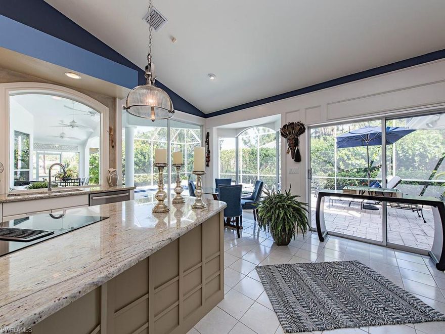 H.12865 - This beautifully renovated home showcases Custom Woodworking thru-out, Artfully Modern Master Bath with views of the sky from the shower, Stunning Light and Luxe Kitchen offering a softly hued cream and gray Granite Island Bar opening to the Family Room with Wood Burning Fireplace. Features an Oversized Pool, Large Covered Lanai in a Private Setting.  An additional 9 x 9  Air Conditioned Room on the lanai with plumbing and gas line in place can be easily converted to an extra bath, office, artist studio, outdoor kitchen or exercise room. Many updates and upgrades complete this highly desirable home.  Pelican Landing offers a state of the art Fitness Center, Private 34 acre Beach Island, Canoe & Kayak Park, Bocce Ball & Pickleball, 12 Tennis Courts, Fitness Center and Sailing Club all included in your master HOA with optional 36 holes of Championship golf.