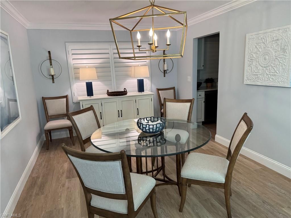 Photo of 4160 Crayton RD #A1, NAPLES, FL 34103 (MLS # 226003357)