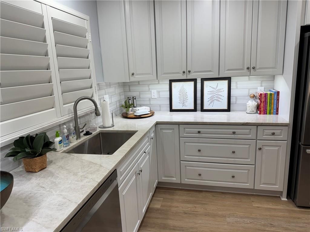 Photo of 4160 Crayton RD #A1, NAPLES, FL 34103 (MLS # 226003357)