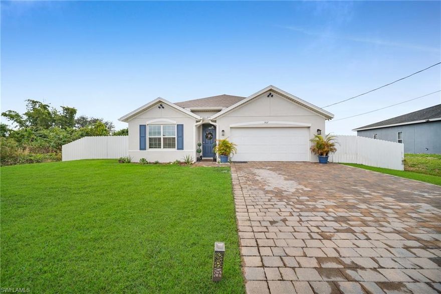 This beautifully maintained home, built just two years ago, offers exceptional value in the highly sought-after 33971 ZIP code — with one of the best prices per square foot in Lehigh Acres! Located at 3017 26th St W, this residence was thoughtfully designed for long-term comfort and durability, including construction on an elevated pad for added peace of mind during heavy rain.

The open floor plan features 4 bedrooms, 2 bathrooms, and soaring 9-foot ceilings with 10-foot vaulted accents that fill the home with natural light. Modern finishes include polished Venato porcelain tile throughout, and sleek white quartz countertops in the kitchen.

The spacious master suite provides a true retreat with two walk-in closets and a luxurious bathroom featuring a freestanding shower and dual sinks. 

Conveniently located near I-75, this property offers quick access to Fort Myers, Southwest Florida International Airport, and the world-famous beaches of Sanibel and Captiva Islands.