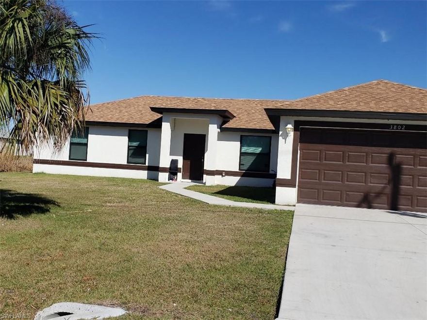 Spacious 4 bedroom single family home with a large great room, 2 full baths, 2 car attached garage, laundry room, small patio in the rear yard, nice location in Lehigh Acres. Built in 2020 !