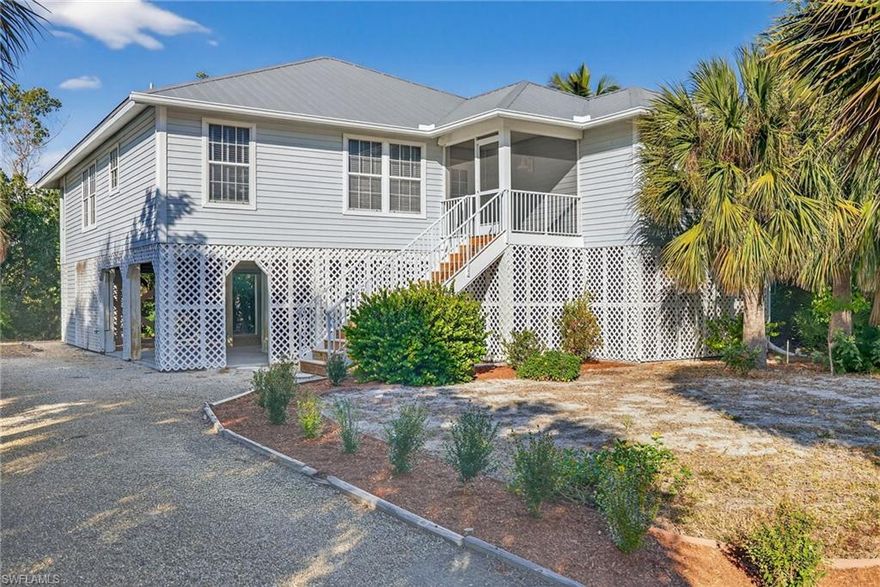 This elevated canal home on the east end of Sanibel Island blends relaxed coastal charm with smart, functional design. Offering three bedrooms and two baths, one bedroom is currently used as an office, making it ideal for remote work or flexible guest space. The home is being sold partially furnished, allowing you to settle in comfortably while still making it your own.

A welcoming screened front porch sets the tone and is the perfect place to start the day with coffee and island breezes. Inside, the living and dining areas flow together effortlessly and open to the kitchen, creating a bright, comfortable space for everyday living and entertaining. From the main living areas and the primary bedroom, step out to the screened back porch overlooking the canal and lush vegetation. With western rear exposure, this space becomes especially magical in the evenings, offering colorful sunset skies and a front row seat to golden hour.

The primary suite is spacious and inviting, with direct porch access and a well appointed bathroom featuring a separate soaking tub and walk in shower. It is a calm, private retreat that feels exactly how island living should.

Below the home, covered parking provides protection from the elements along with generous storage for bikes, beach gear, and everything that comes with life on Sanibel. A private elevator offers easy access to the main living level, adding everyday convenience without sacrificing charm.

Set along a quiet canal and located on the desirable east end of Sanibel, this home delivers a relaxed waterfront lifestyle with beautiful sunsets, coastal comfort, and the easygoing pace people come to the island for and never want to leave.