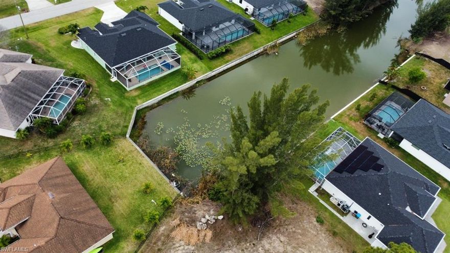 RARE Find!! 1/2 Acre +/- Freshwater Lot (Approx 22,203 SF of land) in SW Cape Coral # 1 Zip code Close to schools, shopping and dining! Don't miss your opportunity to build your Dream Home with Southwestern Sunset Views over waterfront Canal. Any and all City Water and Sewer balances to be assumed by buyer from closing date forward.
Great location for New Construction and oversized homesite offer much opportunity for oversized Garage space and 
space possible for 2 homes with proper lot line shift allowing for minimum setbacks within the City of Cape Coral land building and zoning codes, Inquire within. No building deadline date. Design and build now or hold and build when you are ready. New Construction Homes in SW Cape Coral Florida are reselling with extreme profits and here is your chance to own and capture the land that will grant you the value and equity you deserve.