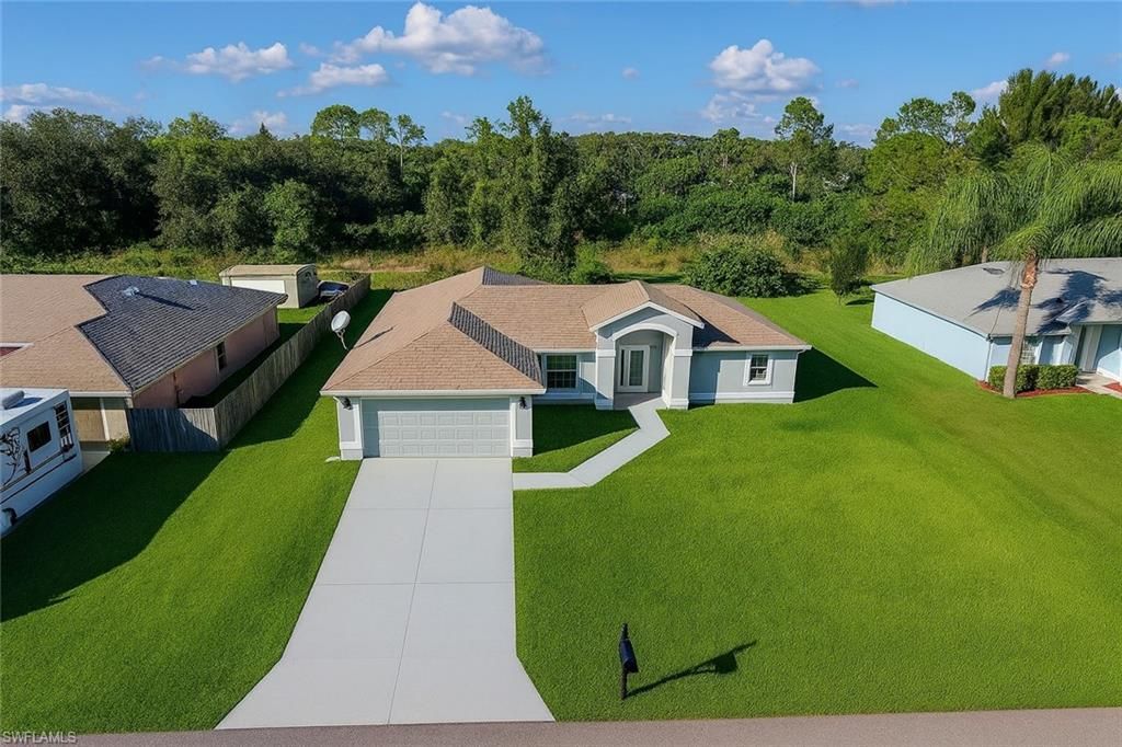 Photo of 116 Ridgemont DR, LEHIGH ACRES, FL 33972 (MLS # 226012067)