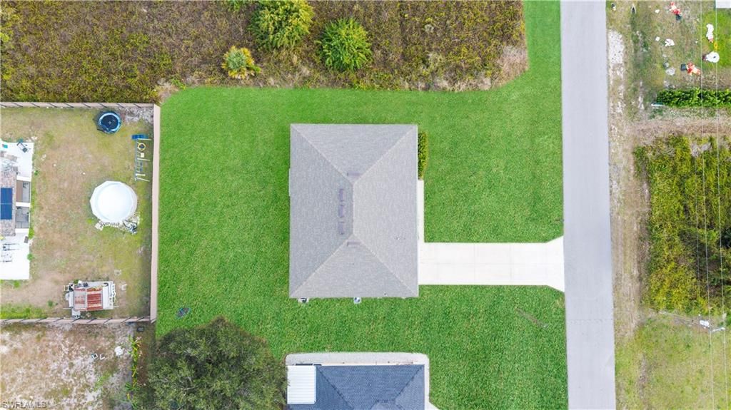 Photo of 4216 20th ST SW, LEHIGH ACRES, FL 33976 (MLS # 225084391)