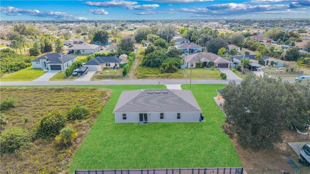 Photo of 4216 20th ST SW, LEHIGH ACRES, FL 33976 (MLS # 225084391)