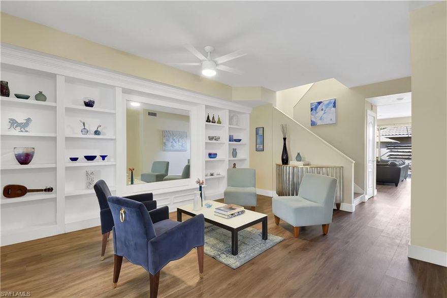 Fantastic opportunity to own in a unique gated Naples community! Offering a peaceful lake view from the front of home, easy walk to all amenities which include USPS, restaurant, and gas station! Meticulously cared for & beautifully renovated- new a/c 2020, washer/dryer 2017, new water heater in 2016, LED lighting throughout, new fans/light fixtures (some w/ dimmers), cabinets added including soft closing drawers & under lighting, new baseboards & casings on doors, quartz countertops throughout, updated bathrooms, and freshly painted interior. All bedrooms are situated on the second floor and all have custom closet systems. On the first floor you will find a living room, family room, kitchen, laundry closet, half bath, and huge under staircase storage room. A screened courtyard connects the home & the 2-car garage- this lanai has plenty of room for a pool/spa if desired and features an electric awning. Island Walk is a beautiful community that is gated & has guard 24/7. The lakefront Town Center that offers activities for everyone- social planned events, tennis, bocce ball, fitness center, pickleball, resort style pool, lap pool, lawn bowling, putting green, & more!