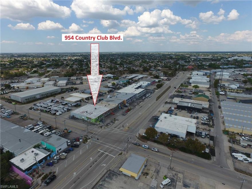This industrial building measures 3,700 sf (37' X 100'). The office portion faces Country Club Blvd., has two separate glass door entrances. The door on the right would be considered the main entrance immediately walking into the lobby, 3 offices, staging area near shop, a small storage room and restroom. The door on the left allows a private entrance to the massive conference room which isn't the only option to gain access since access is also available just off the lobby. Warehouse is wide open space with two overhead doors facing the alley. Ready for occupancy.