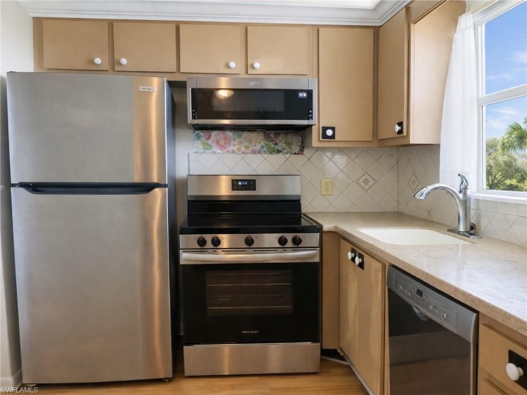 Photo of 4380 27th ST SW #407, NAPLES, FL 34116 (MLS # 226010290)