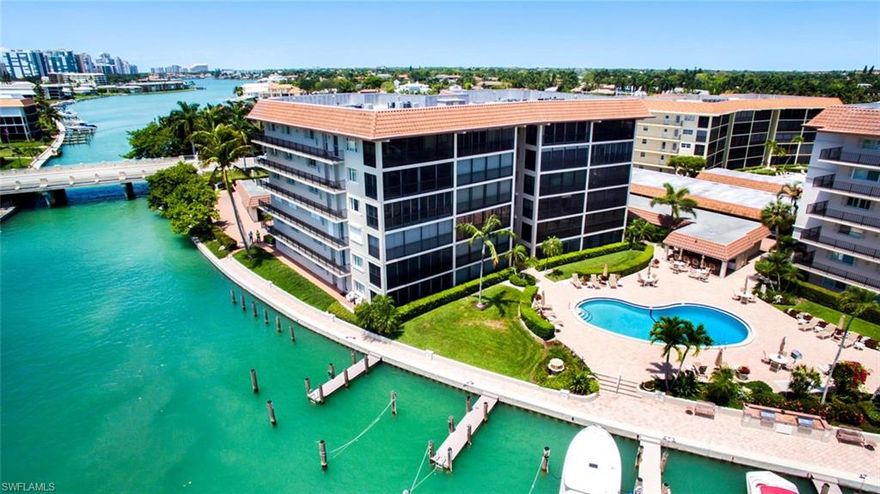 This one-of-a-kind, professionally designed residence with spectacular Moorings Bay views is now offered at a new, competitively reduced price to reflect the owner’s true level of motivation. The expansive floor plan affords plentiful areas to entertain while still offering a large, private master suite, as well as an additional guest bedroom and full bathroom. 

As soon as you walk through the front door, you will find an inspiring main living area with abundant natural light, granite countertops, solid wood cabinetry, stainless steel appliances, 5-inch custom architectural shutters, raised ceilings, and custom millwork throughout.
 
The sugar sand Gulf beaches are only a short five-minute walk away, and the pool with a renovated indoor/outdoor kitchen is just steps from your front door. Located near Old Naples cultural epicenter, as well as upscale dining and world-class shopping at Venetian Village, residents of The Moorings find themselves only moments from the very best attractions Naples has to offer. Several generous direct Gulf-access boat slips are available for lease. Eligible for immediate Moorings Beach Club membership.  Can be offered turnkey upon request.