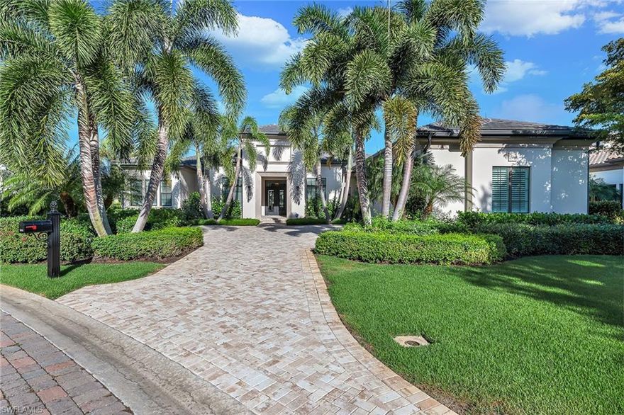 In perfect harmony with its surroundings, this stunning home blends indoor and outdoor spaces along with luxurious details to create a modern, inviting retreat. Built in 2015, floor-to-ceiling hurricane impact sliding doors connect the owner’s suite, living room and family room to the expansive outdoor spaces. Marble floors throughout the home are accented by white cabinetry and quartz countertops creating a bright and welcoming appeal. Design elements include custom wall and ceiling treatments, linear vents, and solid core doors. Delight in the custom kitchen featuring luxury appliances, soft-close drawers and doors, and oversized pantry as well as the convenience of under cabinet lighting. Peace of mind can be found with the three HVAC units, a whole-house water filtration system, and a whole-house generator. Additional features include a Control4 lighting system, saltwater pool, central vacuum and more. Located in the award-winning community of Mediterra, featuring two Tom Fazio golf courses, pickleball, tennis and a private beach club.