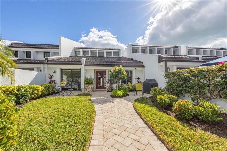 Experience Luxurious Golf Course Living in Bear’s Paw. Secure an IMMEDIATE GOLF MEMBERSHIP—no waitlist required—in this sun-drenched, turnkey-furnished two-bedroom villa on the coveted Jack Nicklaus course. Nestled in the heart of Naples, wake up to stunning southern golf course views through soaring ceilings and an open, light-filled layout. The updated kitchen features sleek dark cabinetry, a wine cooler, granite countertops, and Stainless-steel appliances. The split-bedroom floor plan offers privacy and comfort, with well-separated living spaces ideal for guests or a home office setup and seperate laundry room. Enjoy seamless indoor-outdoor living from a spacious lanai with a retractable sunshade, perfect for morning coffee or entertaining. The detached two-car garage includes a golf cart and charger for convenience. Steps away from the pool and spa, residents can also enjoy the new state-of-the-art clubhouse, Fitness Center, Jack Nicklaus Signature Golf Course, bocce courts, pickleball, tennis courts, dog park, driving range, two putting greens, and a private marina with Gulf access. Bear’s Paw is a gated, manned 24 hours a day, with a walking/biking path to downtown Naples and less than three miles to the beach. This villa purchase offers immediate access to the Bear’s Paw golf membership, making it the perfect opportunity to skip the membership waitlist. Don't miss out on this exceptional lifestyle opportunity in the City of Naples. Seller would like to close after May 15, 2026.