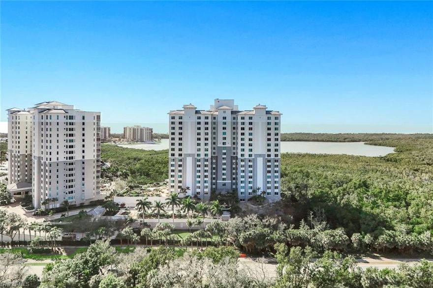 Positioned within prestigious Grande Geneva at The Dunes of Naples, this furnished ground-floor residence blends timeless elegance with expansive design and effortless resort-style living. Spanning 2,798 square feet, this three-bedroom, three-bath home offers a sophisticated coastal retreat with seamless access to exceptional amenities just beyond your lanai. A grand double-door entry and refined finishes set the tone for understated luxury. Inside, an expansive layout unfolds beneath crown molding and architectural detailing, including traditional raised panel wainscoting that adds depth and character. Marble flooring flows throughout the main living areas and bathrooms, enhancing the sense of scale while creating a polished aesthetic, while the bedrooms are appointed with luxury vinyl flooring for both comfort and durability. The gourmet kitchen is both functional and striking, featuring warm maple cabinetry, gleaming granite countertops, a built-in wine cooler, gas range with professional vent hood, built-in wall oven, and high-end refrigerator. A tray ceiling with soft cove lighting casts a warm ambient glow, elevating the space with subtle architectural detail. The owner’s suite is a serene sanctuary with a custom boutique-style walk-in closet featuring floor-to-ceiling built-ins. The spa-inspired primary bath offers an expansive dual vanity with designer gold fixtures, a full-width framed mirror, and an oversized glass-enclosed shower integrated with a soaking tub, creating a refined space designed for relaxation. Two additional guest bedrooms provide comfort and privacy, with one including its own private ensuite bath. Modern enhancements include newer HVAC systems, a newer hot water heater, and Bose surround sound hardwired throughout the main living areas and primary suite. French door sliders open to a screened lanai where this residence truly distinguishes itself. As a rare ground-floor offering, you step onto your own private terrace before enjoying direct walk-out access to the resort-style pool, spa, and community room. The seamless indoor-outdoor flow allows you to stroll to the amenities just steps from your door while maintaining the privacy of your own outdoor retreat. Residents of Grande Geneva enjoy a fitness center, pool and hot tub, grilling areas, and welcoming social spaces. Ownership includes access to The Club at The Dunes, featuring a spectacular resort-style pool, Tiki bar, upscale dining, state-of-the-art fitness center, and active tennis and pickleball programs. Also included is transferable membership to the exclusive Floridian Beach Club, providing private access to Vanderbilt Beach with a beachfront pool, restaurant, indoor and outdoor seating, attentive beach services, and private shuttle service from lobby to sand. Minutes from world-class shopping, fine dining, and Southwest Florida International Airport, this distinguished residence captures the essence of refined Naples living.