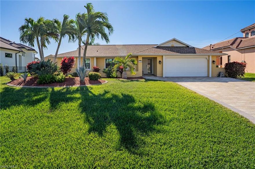 Located in one of Southwest Cape Coral’s most desirable boating neighborhoods in close proximity to Tarpon Point Marina, this GULF ACCESS pool home is situated on an oversized lot with 125’ OF WATER FRONTAGE and boasts SOUTHERN REAR EXPOSURE—a rare combination that delivers sunlight, space, and exceptional boating lifestyle appeal.

Enjoy quick unrestricted boating access that is only 8 minutes from your dock to the river! Boater’s will love the well-appointed dock featuring a 13,000 lb boat lift with canopy and an expanded dock (2025)—ideal for entertaining, relaxing, and easy access to your boat. The large side yard and expansive outdoor space set this property apart, offering flexibility rarely found on waterfront homes.

Inside, the home has been completely remodeled and updated and is move-in ready with tile flooring throughout, a spacious living area featuring vaulted ceilings, and a bright, open layout that is perfect for the casual Florida lifestyle. The updated kitchen (2023) includes custom wood cabinetry, quartz countertops, a center island, kegerator, and plenty of storage space—perfect for casual gatherings and entertaining alike. Impact-resistant windows and doors, along with electric roll-down storm shutters, provide added peace of mind.

Major updates include a new roof (2023), new AC (2023), expanded driveway (2025), and extensive updates completed in 2015—making this home an easy choice with all the big-ticket items already handled.

A true boating and outdoor lifestyle property with a prime location, oversized lot, and exceptional waterfront features—this home checks all the boxes. Surrounded by million dollar homes on a quiet, dead-end street, this location is truly hard to beat! This home is east to show and priced to sell. Don’t let this one slip away! Secure your “Piece of Paradise” today!