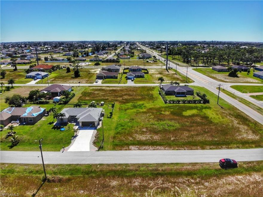 Priced to sell, in a growing area of Cape Coral.  Surrounded by newer homes, this lot has a south facing rear view, which means when you build a pool, it will be naturally heated by the sun as it passes east to west all day, yet your lanai will be in the shade.  Cape Coral is one of the fastest growing areas in the country! Desirable and full of amenities. Conveniently located close to shopping, schools, restaurants, fishing, parks, and downtown Ft. Myers is only minutes away. Cape Coral is a safe, clean, newer city, incorporated in 1970. One of the largest cities in Florida in square miles, yet only 1/3rd developed.  Cape Coral is famous for having over 400 miles of canals.